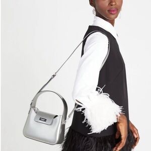 Kate spade Sam icon metallic patent leather mini hobo bag in starlight spazzola